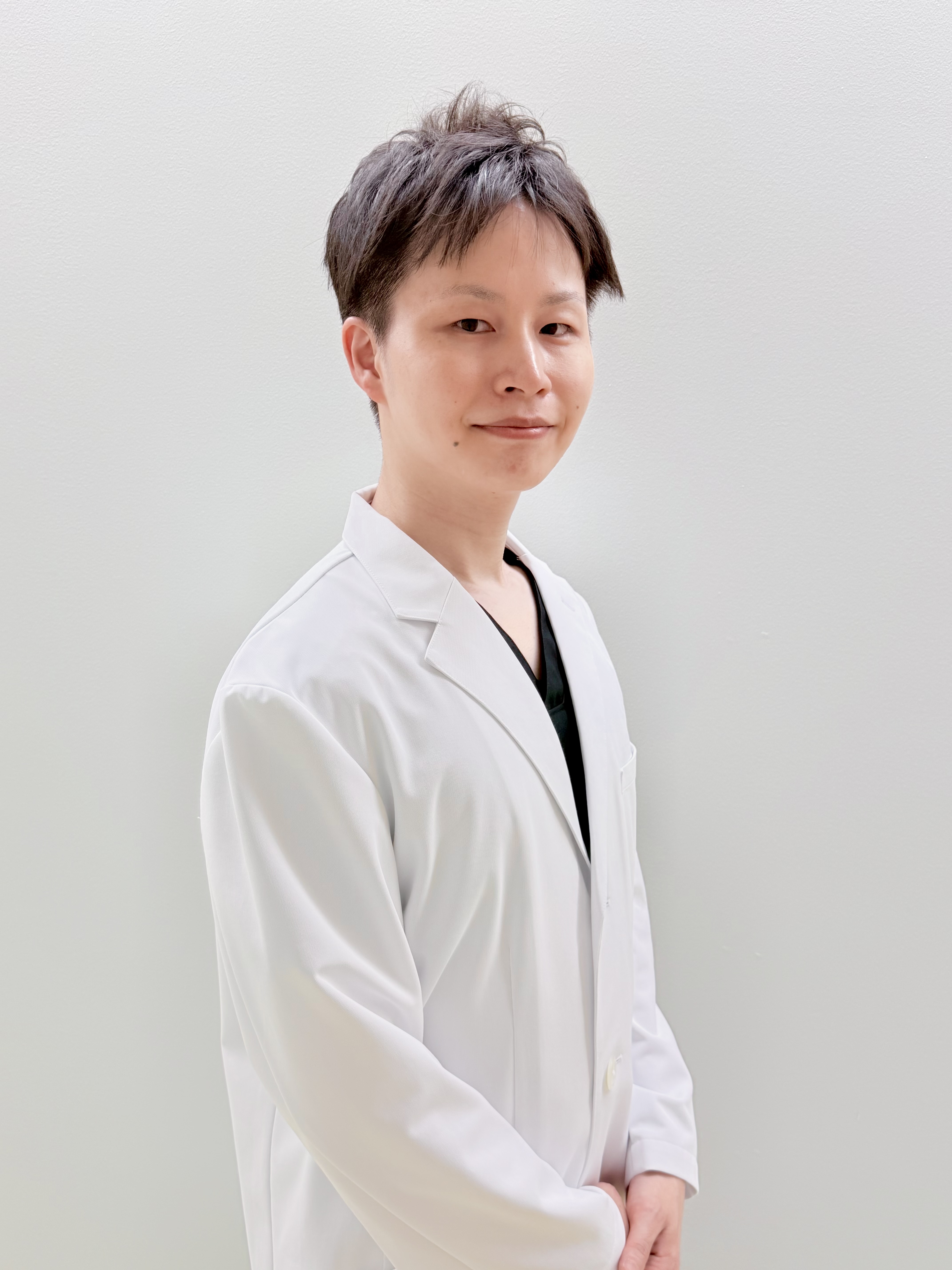 圓尾 拓也