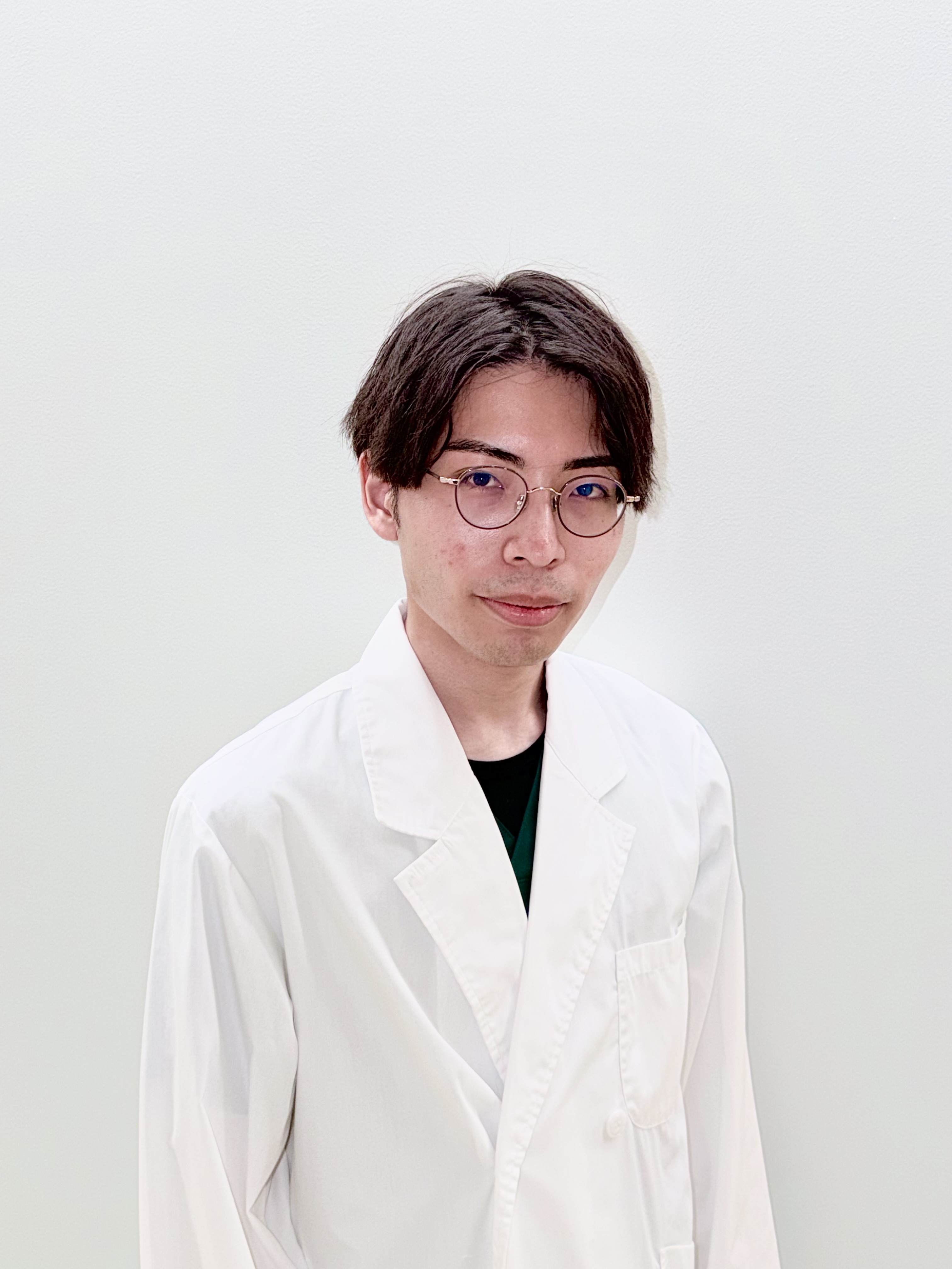 圓尾 拓也