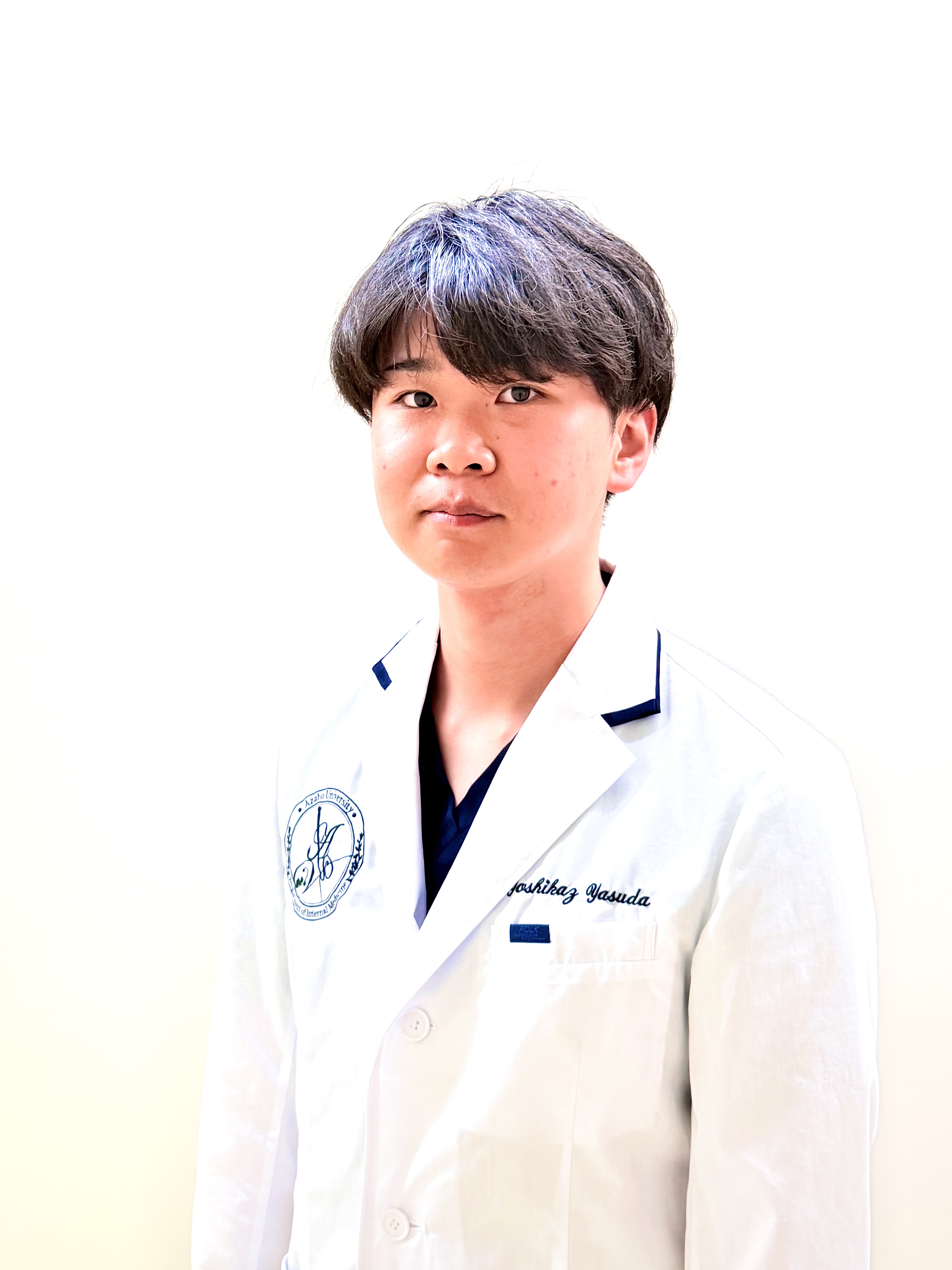 圓尾 拓也