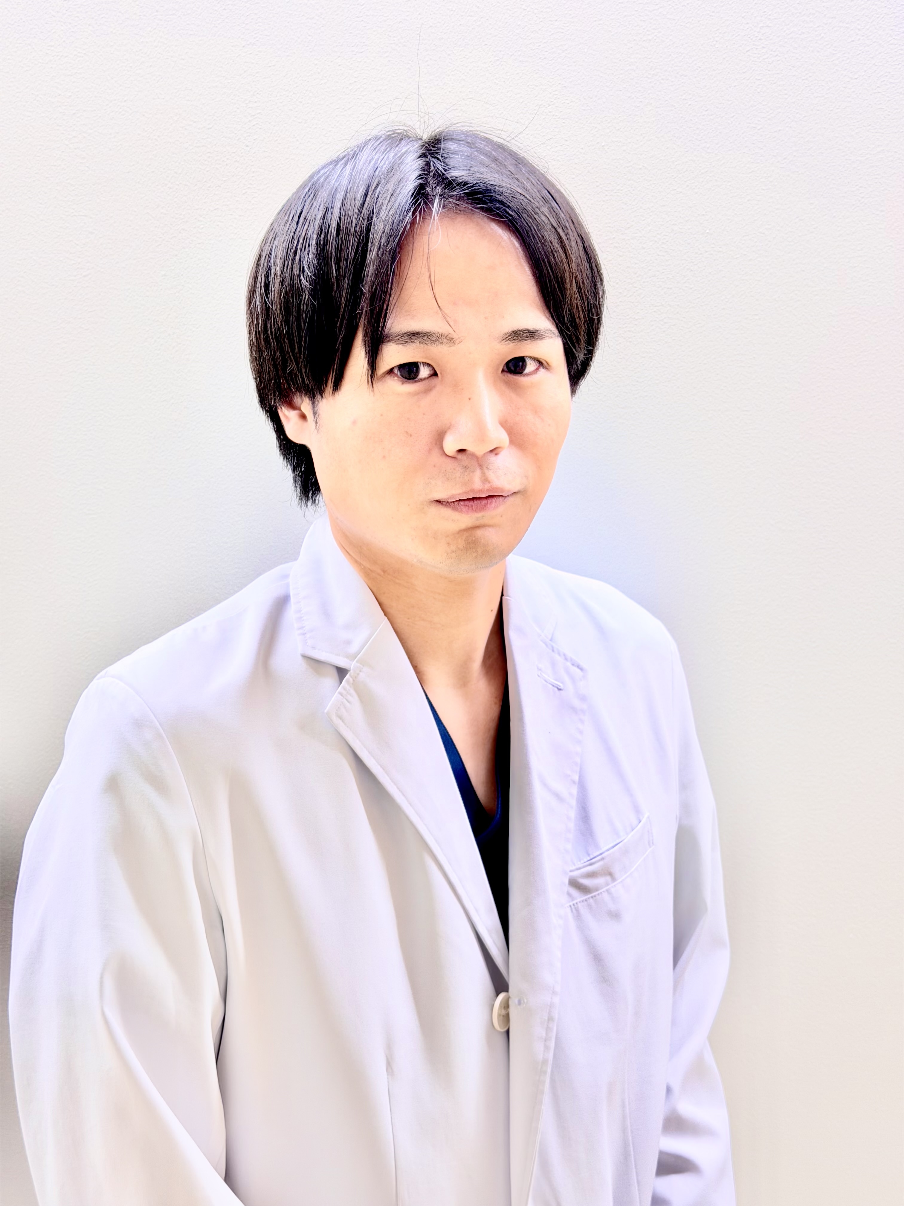 圓尾 拓也